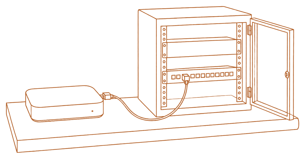 Line drawing of the machine on a shelf beside a network cabinet, connected by one ethernet cable